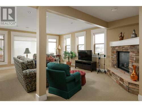 658 Peridot Place, Kelowna, BC - Indoor Photo Showing Living Room With Fireplace