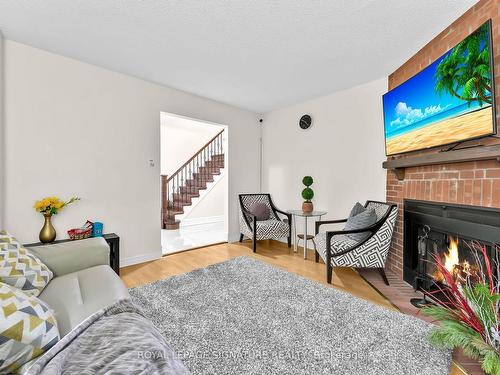 24 Mcgraw Ave, Brampton, ON - Indoor Photo Showing Living Room With Fireplace