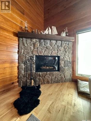 241 Moose Road, Crooked Lake, SK - Indoor Photo Showing Living Room With Fireplace