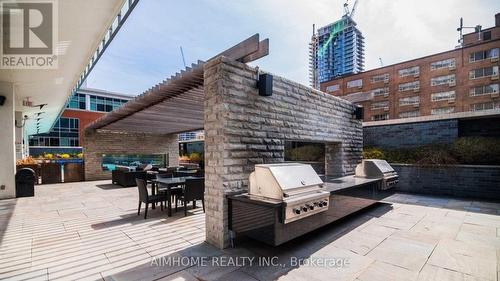 #605 -33 Charles St E, Toronto, ON - Outdoor With Fireplace