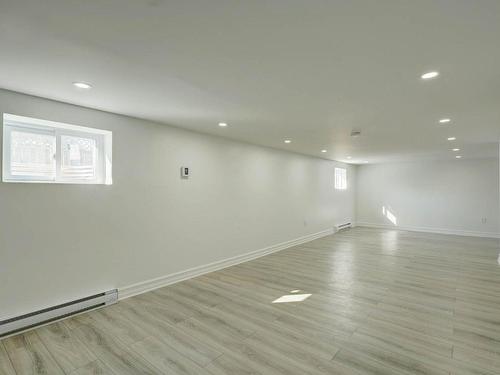 Salle familiale - 10 Rue Savary, Laval (Auteuil), QC - Indoor Photo Showing Other Room
