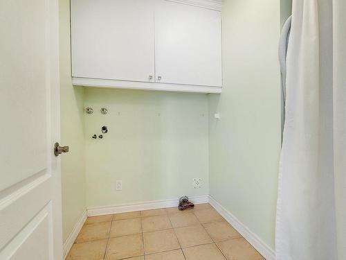 Laundry room - 103-4360 Rue Du Catamaran, Laval (Fabreville), QC - Indoor Photo Showing Other Room