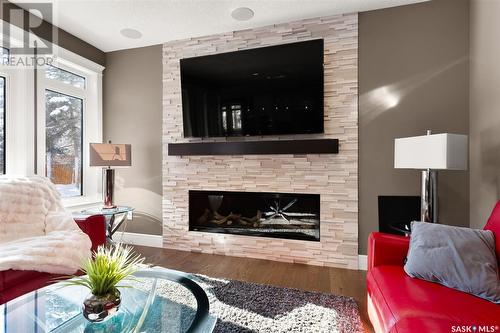3035 Quinn Drive, Regina, SK - Indoor Photo Showing Living Room With Fireplace
