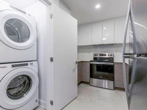 Salle de lavage - 514-5265 Av. De Courtrai, Montréal (Côte-Des-Neiges/Notre-Dame-De-Grâce), QC - Indoor Photo Showing Laundry Room