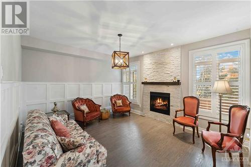 779 Fiddlehead Street, Gloucester, ON - Indoor Photo Showing Living Room With Fireplace