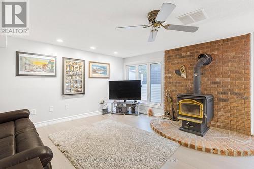 5617 7 Line N, Oro-Medonte, ON - Indoor Photo Showing Living Room With Fireplace