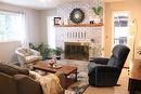 2782 20Th Street, Lister, BC  - Indoor Photo Showing Living Room With Fireplace 