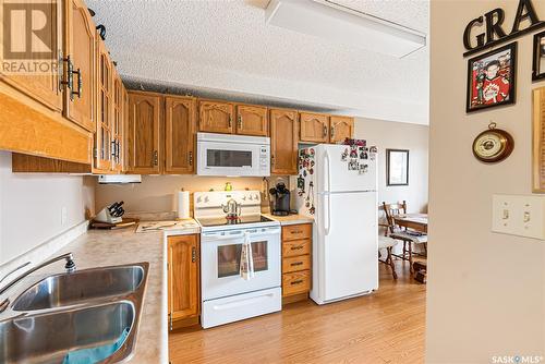 106 42 27Th Street E, Prince Albert, SK - Indoor Photo Showing Kitchen With Double Sink