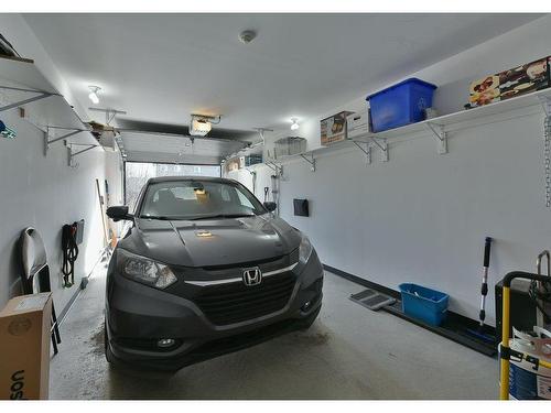 Garage - 101-50 Rue Lemieux, Granby, QC - Indoor Photo Showing Garage