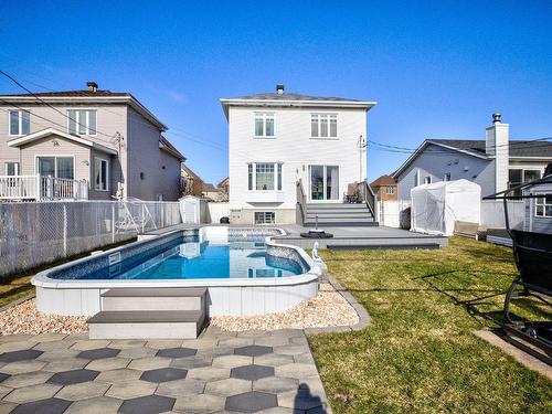 Backyard - 825 Rue Bourgeoys, Sainte-Catherine, QC - Outdoor With Above Ground Pool