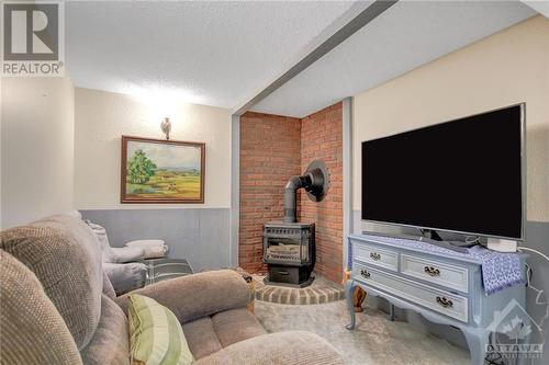 1331 Bloomsbury Crescent, Ottawa, ON - Indoor Photo Showing Living Room With Fireplace