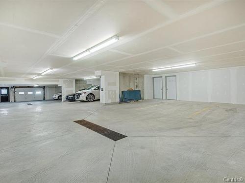 Garage - 18-661 Boul. Adolphe-Chapleau, Bois-Des-Filion, QC - Indoor Photo Showing Garage