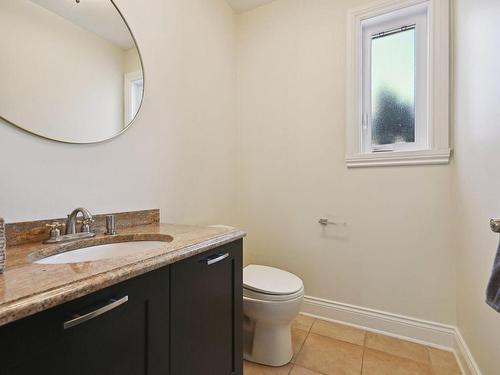 Powder room - 303A Brighton Drive, Beaconsfield, QC - Indoor Photo Showing Bathroom