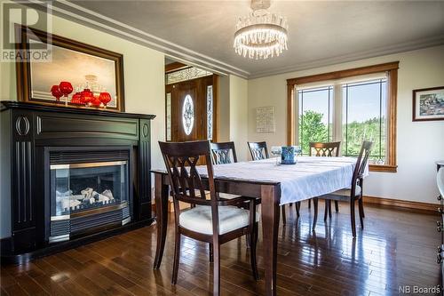 1827 Rte 870, Springfield, NB - Indoor Photo Showing Dining Room With Fireplace