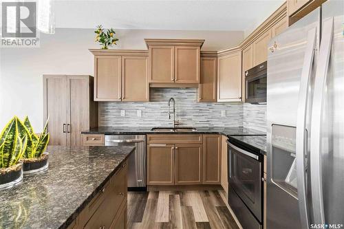 40 115 Veltkamp Crescent, Saskatoon, SK - Indoor Photo Showing Kitchen With Upgraded Kitchen