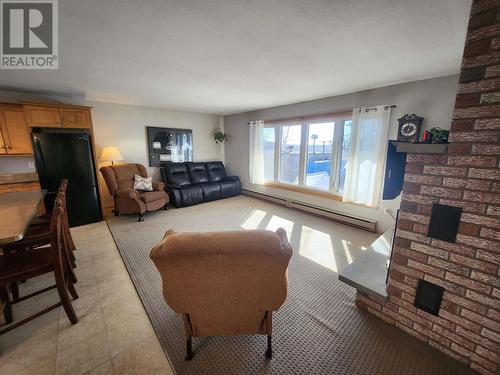 118 Superior Ave, Wawa, ON - Indoor Photo Showing Living Room With Fireplace
