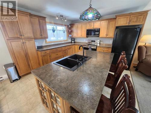 118 Superior Ave, Wawa, ON - Indoor Photo Showing Kitchen With Double Sink