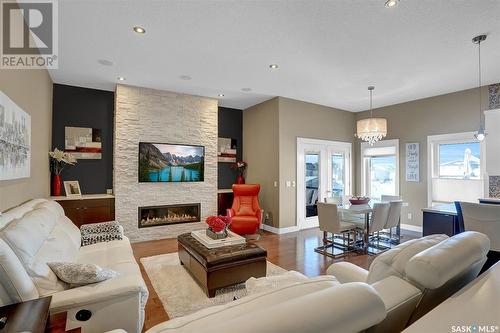 3521 Green Marsh Crescent, Regina, SK - Indoor Photo Showing Living Room With Fireplace