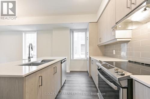#119 -30 Almond Blossom Mews, Vaughan, ON - Indoor Photo Showing Kitchen With Double Sink With Upgraded Kitchen