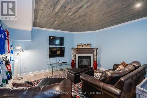1913 Elana Dr, Severn, ON - Indoor Photo Showing Living Room With Fireplace