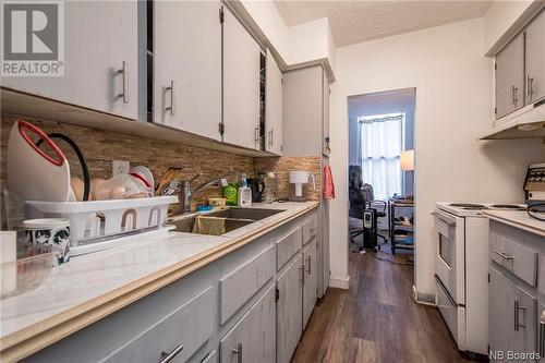 50-52 Queen Street, Saint John, NB - Indoor Photo Showing Kitchen With Double Sink