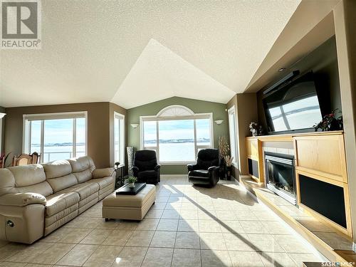 208 Mckillop Place, Last Mountain Lake East Side, SK - Indoor Photo Showing Living Room With Fireplace