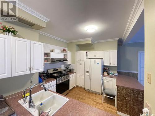 2230 Rose Street, Regina, SK - Indoor Photo Showing Kitchen With Double Sink