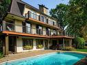 Back facade - 136 Ch. Des Brèches, Piedmont, QC  - Outdoor With In Ground Pool 