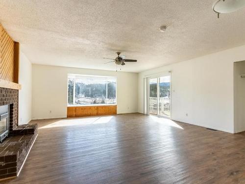 1738 Frontage Road, Clinton, BC - Indoor Photo Showing Living Room With Fireplace