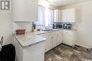 202 7Th Avenue Ne, Swift Current, SK  - Indoor Photo Showing Kitchen With Double Sink 