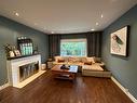 128 13Th Avenue S, Cranbrook, BC  - Indoor Photo Showing Living Room With Fireplace 