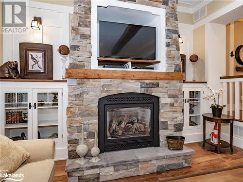 1020 Birch Glen Road Unit# Villa 7 W8, Baysville, ON - Indoor Photo Showing Living Room With Fireplace