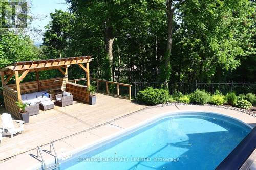 146 Ridgewood Road, Peterborough, ON - Outdoor With In Ground Pool With Deck Patio Veranda With Backyard