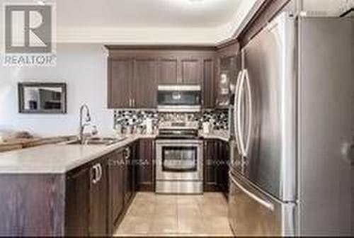 67 Beland Ave N, Hamilton, ON - Indoor Photo Showing Kitchen With Double Sink With Upgraded Kitchen