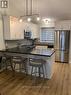 #160 -160 Escarpment Cres, Collingwood, ON  - Indoor Photo Showing Kitchen With Stainless Steel Kitchen With Double Sink With Upgraded Kitchen 