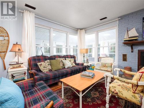 1034 Dorcas Bay Road, Tobermory, ON - Indoor Photo Showing Living Room With Fireplace