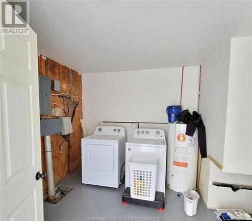 255 Jasmine, Beresford, NB - Indoor Photo Showing Laundry Room