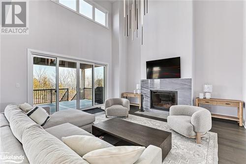 107 Sladden Court, Thornbury, ON - Indoor Photo Showing Living Room With Fireplace