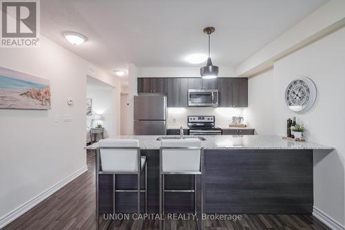 #205 -6 Anchorage Cres, Collingwood, ON - Indoor Photo Showing Kitchen With Stainless Steel Kitchen With Upgraded Kitchen