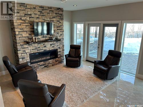 29 Pape Drive, Humboldt Lake, SK - Indoor Photo Showing Living Room With Fireplace