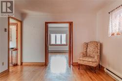 Main Unit: Formal Living room, doorway leading to another living space - 