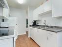 308-2520 Wark St, Victoria, BC  - Indoor Photo Showing Kitchen With Double Sink 