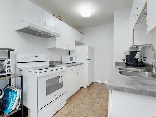 308-2520 Wark St, Victoria, BC - Indoor Photo Showing Kitchen With Double Sink
