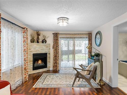 1688 Lailah'S Loop, Qualicum Beach, BC - Indoor Photo Showing Living Room With Fireplace