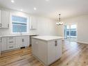 3406 Nikkei Pl, Cumberland, BC  - Indoor Photo Showing Kitchen With Upgraded Kitchen 
