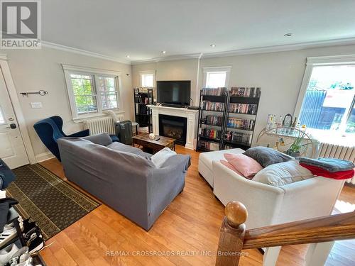 1756 Queen Street E, Toronto, ON - Indoor Photo Showing Living Room With Fireplace