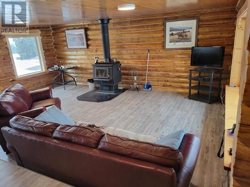 10523 Nithi Pit Road, Fraser Lake, BC - Indoor With Fireplace