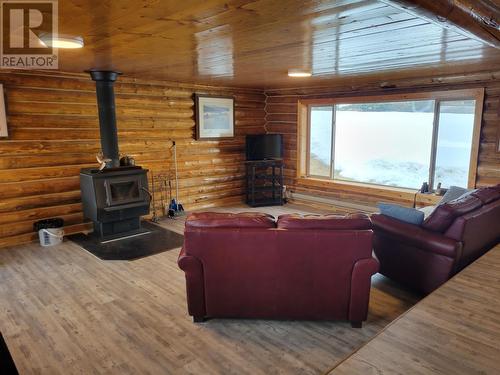 10523 Nithi Pit Road, Fraser Lake, BC - Indoor Photo Showing Living Room With Fireplace