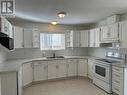 385 Rigsby Street Unit# 102, Penticton, BC  - Indoor Photo Showing Kitchen With Double Sink 