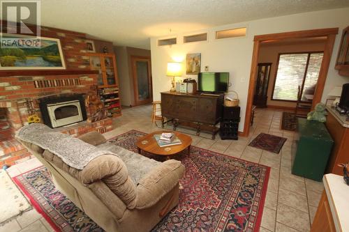 4301 Mclean Creek Road, Okanagan Falls, BC - Indoor Photo Showing Living Room With Fireplace